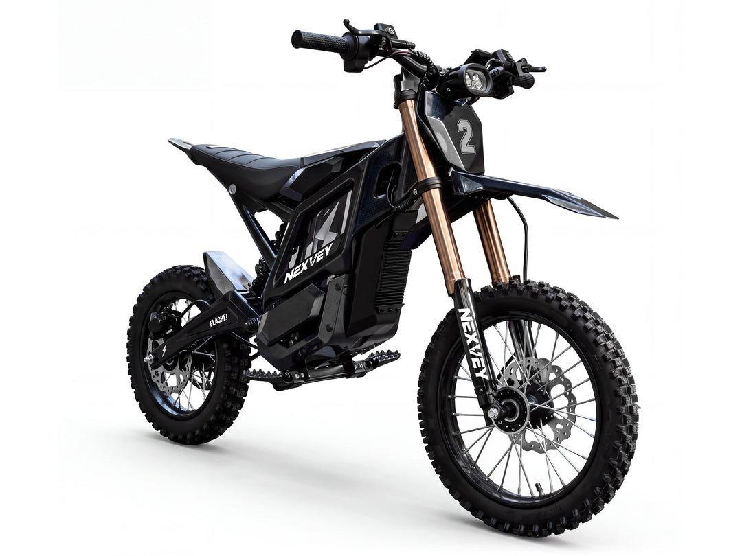 Front three-quarter view of a black NEXVEY FLASH 2 electric dirt bike on a white background