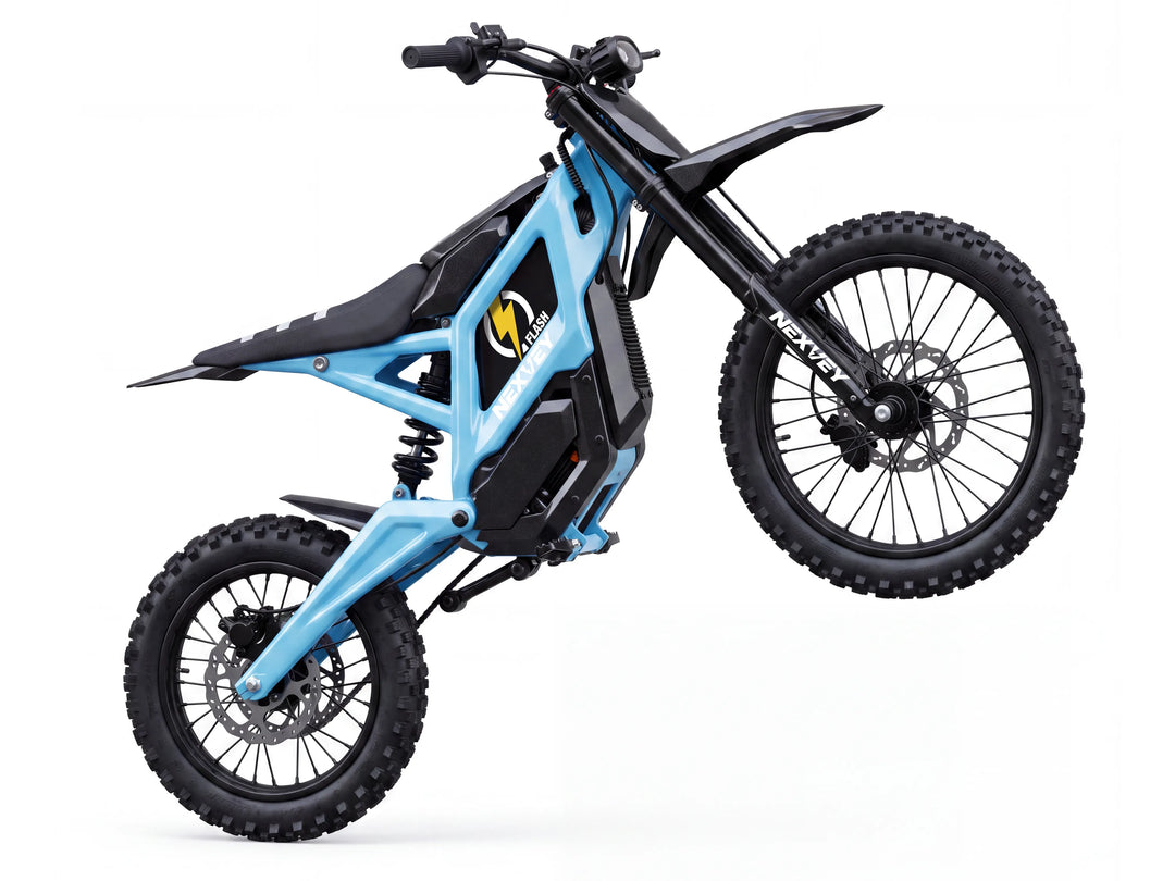 Light blue Nexvey Flash electric dirt bike with front wheel lifted off the ground.