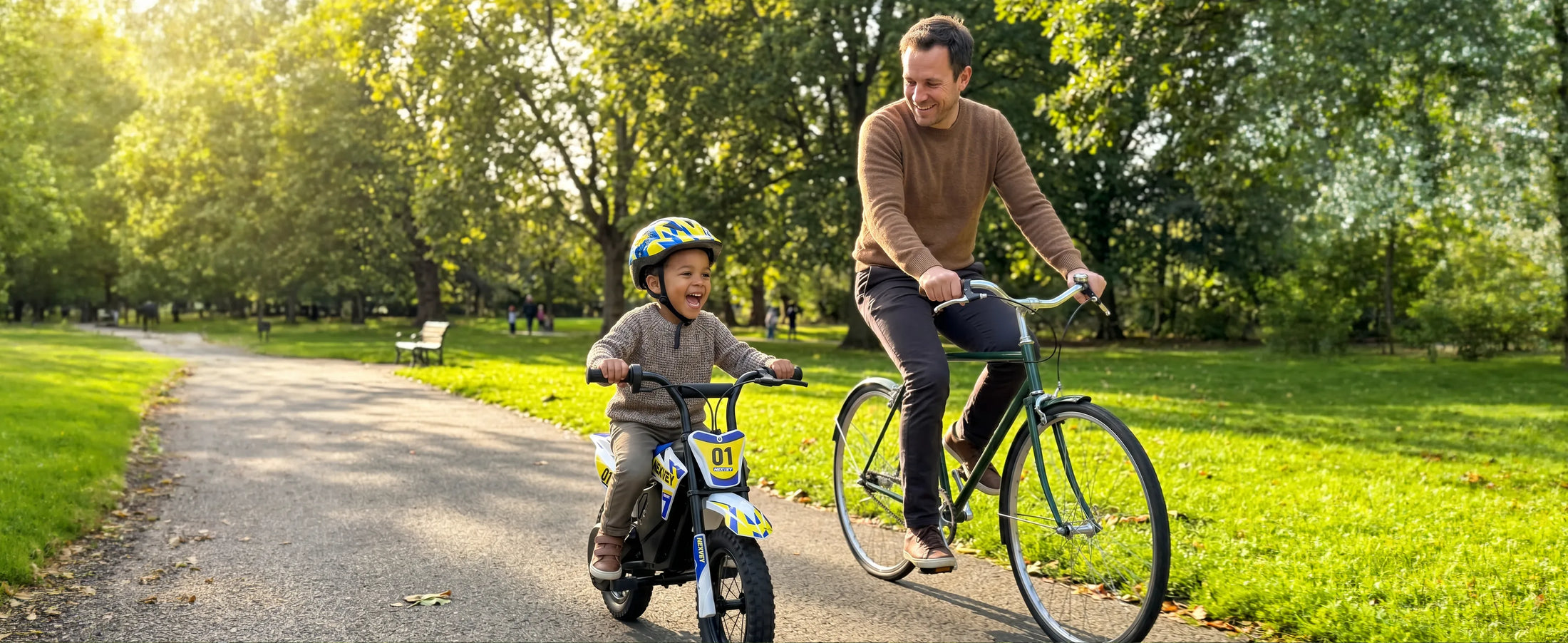 Child riding a NEXVEY Spark 01 electric dirt bike outdoors with family
