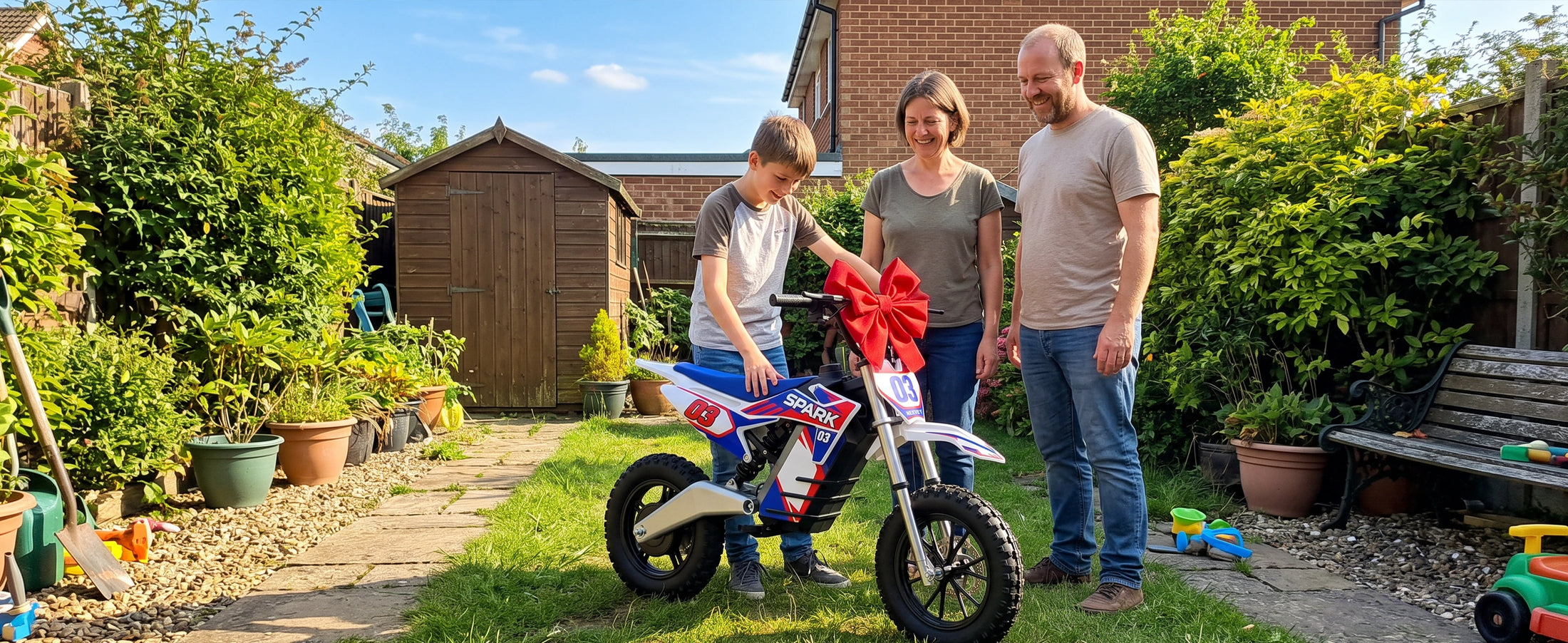 Family giving a NEXVEY Spark 03 Lite electric dirt bike as a kids birthday gift