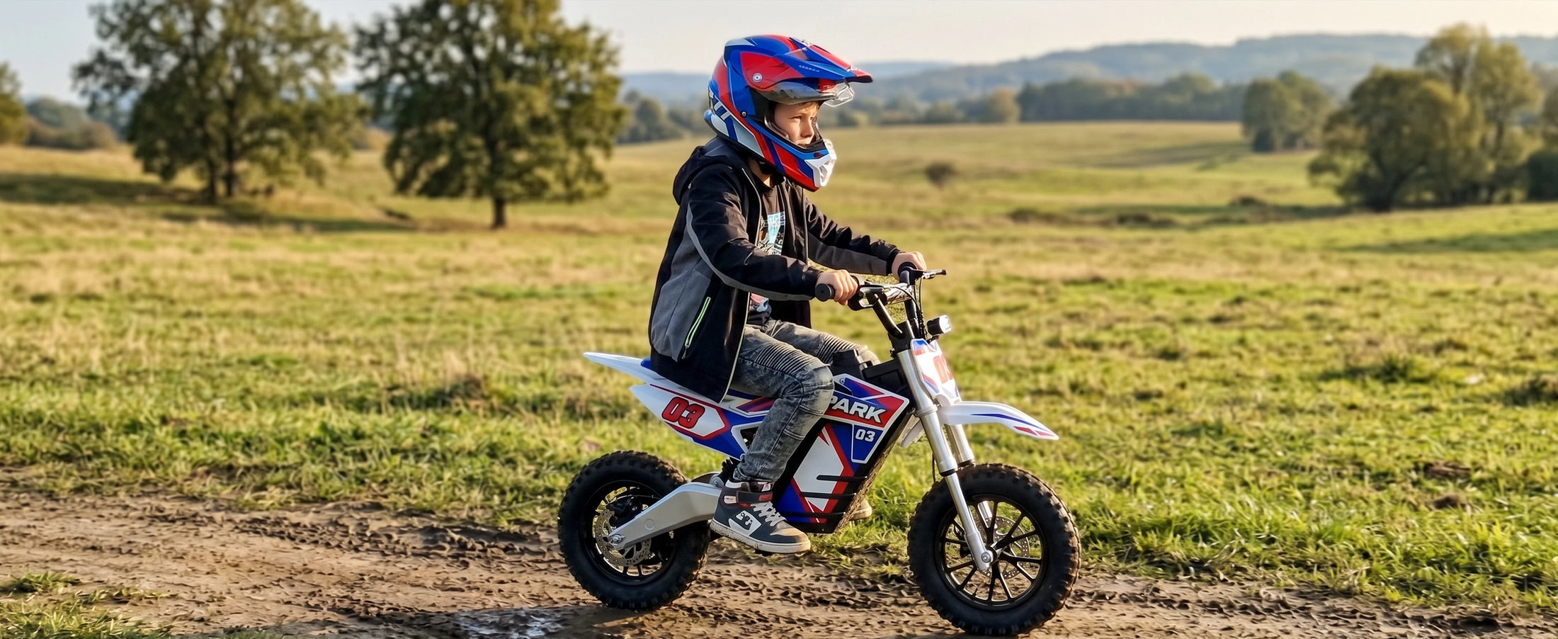 Teen riding a NEXVEY Spark 03 Lite electric dirt bike on an off-road trail