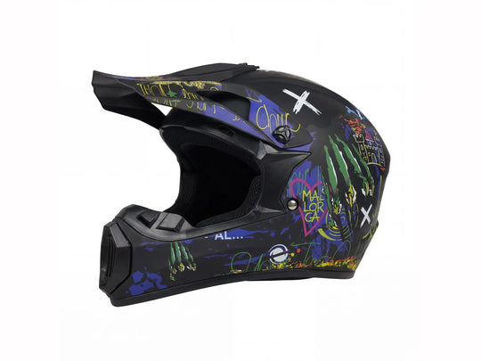 Side view of a matte black full-face motocross helmet with colorful graffiti street art graphics, featuring a protective sun peak and rugged design for off-road dirt bike racing
